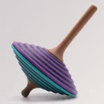 Mader Kreisel Tukan Lila Tuerkis 1024x1024@2x E1733687551312.webp